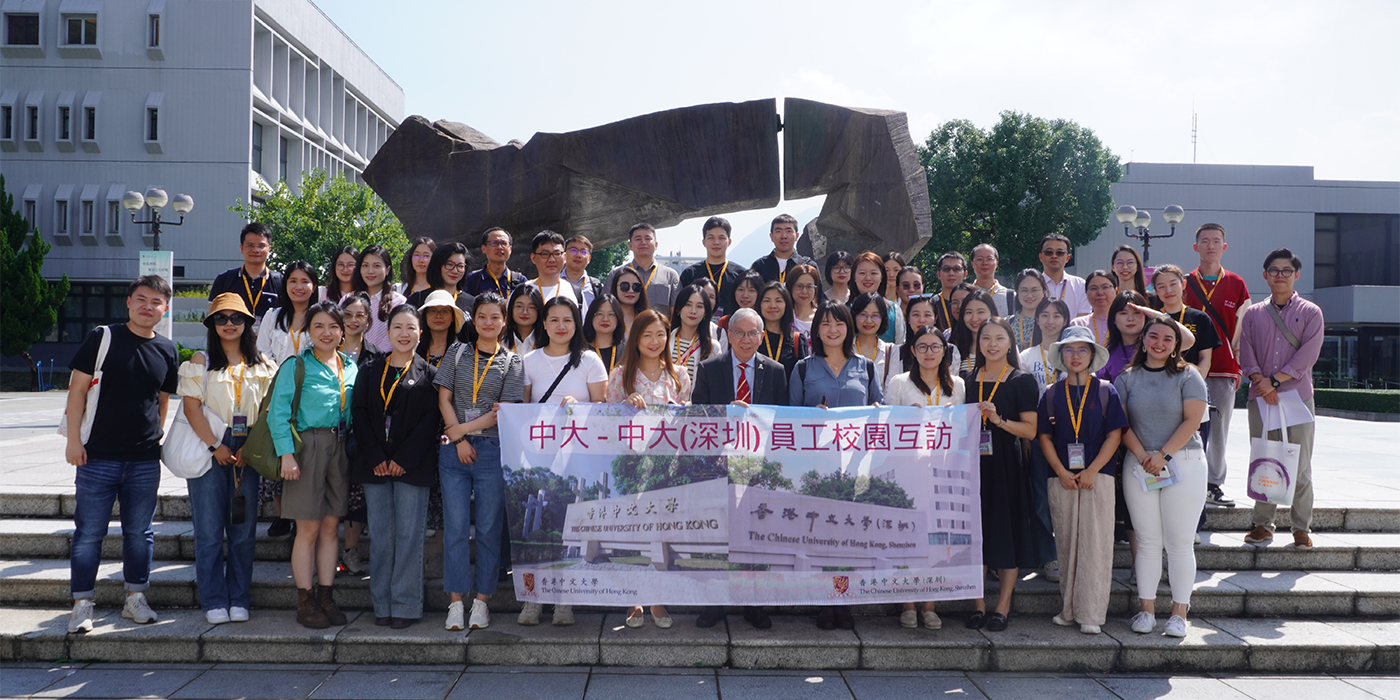 A group photo with Pro-Vice-Chancellor Professor Chan Wai-yee in front of the Gate of Wisdom